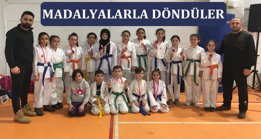 MADALYALARLA DÖNDÜLER