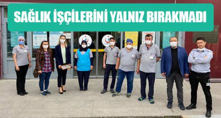 SAĞLIK İŞÇİLERİNİ YALNIZ BIRAKMADI