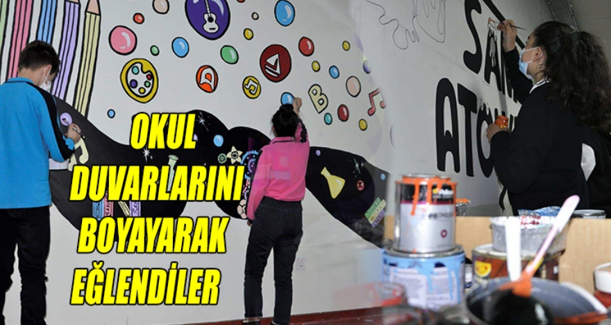 OKUL DUVARLARINI BOYAYARAK EĞLENDİLER