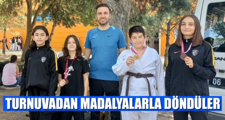 TURNUVADAN MADALYALARLA DÖNDÜLER