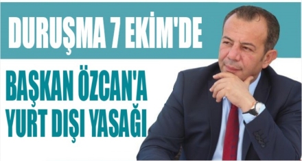Özcan'a yurt dışı yasağı